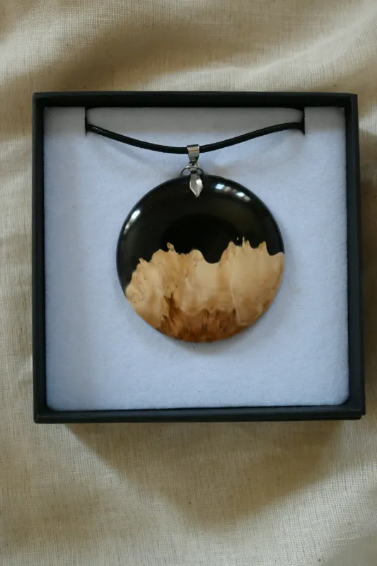 Product: Handmade Wood Pendant with Blue Resin