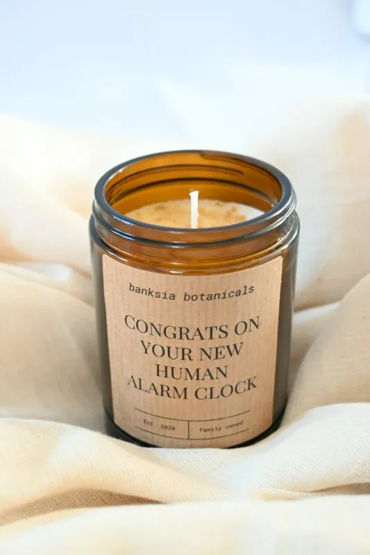 Product: Human Alarm Clock New Baby Soy Wax Candle